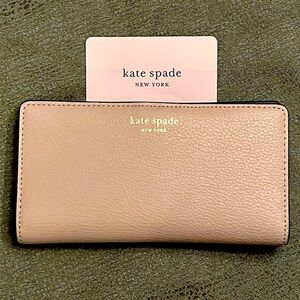 Brand New Kate Spade Genuine Leather Large Slim Bifold Wallet Warm Beige Neutral